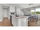 Bright kitchen features stainless steel appliances, a convenient island, dining area and ample counter space for everyday living at 15206 Swallow Falls Way, Fishers, IN 46037