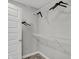 Walk-in closet with shelves, carpeted floor, and white door at 15214 Swallow Falls Way, Fishers, IN 46037