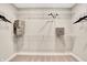 An organized walk-in closet featuring wire shelving, a plush carpet, and neutral paint tones throughout at 15294 Swallow Falls Way, Fishers, IN 46037