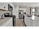 Bright kitchen with stainless steel appliances, ample cabinet space, and modern fixtures at 15310 Swallow Falls Way, Fishers, IN 46037