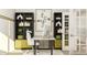 Stylish home office featuring modern desk, shelving, and natural light through glass panel door at 15384 Cardonia Rd, Fishers, IN 46037