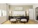 Relaxing main bedroom with tufted headboard, stylish decor, and ample natural light at 15384 Cardonia Rd, Fishers, IN 46037