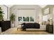 Bright main bedroom featuring neutral decor, accent rug, and comfortable furnishings at 15384 Cardonia Rd, Fishers, IN 46037