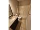 Bathroom features a vanity with granite countertop and a tub/shower combo at 1657 Park Terrace Ct, Indianapolis, IN 46229