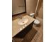 Bathroom features a vanity with granite countertop and tile flooring at 1657 Park Terrace Ct, Indianapolis, IN 46229