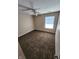Bedroom with neutral walls, ceiling fan and brown carpet flooring at 1657 Park Terrace Ct, Indianapolis, IN 46229