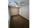 Bedroom with neutral walls, ceiling fan and brown carpet flooring at 1657 Park Terrace Ct, Indianapolis, IN 46229