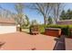 Spacious backyard deck features a hot tub, bench, and nice backyard views at 1665 South Dr, Columbus, IN 47203