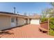 Backyard deck features a bench, door to the home, and some backyard views at 1665 South Dr, Columbus, IN 47203
