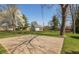 Spacious backyard has an area that could be a patio or basketball court at 1665 South Dr, Columbus, IN 47203