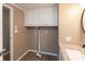 Full bathroom with built in storage above the sink and ample space for organizing at 1665 South Dr, Columbus, IN 47203