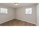 A clean and bright bedroom with a window and plenty of natural light at 1665 South Dr, Columbus, IN 47203