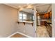 An open-concept kitchen featuring stainless steel appliances and sleek countertops at 1665 South Dr, Columbus, IN 47203