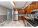 Eat in kitchen with stainless steel appliances and beautiful flooring at 1665 South Dr, Columbus, IN 47203