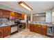Bright kitchen with stainless appliances, tile backsplash and lots of countertop space at 1665 South Dr, Columbus, IN 47203
