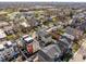 An aerial view showcasing modern townhomes nestled in a vibrant neighborhood at 1811 Livery Way, Indianapolis, IN 46202