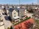 Aerial shot of modern townhomes featuring dark roofs and landscaped surroundings at 1811 Livery Way, Indianapolis, IN 46202