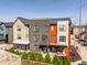 An aerial view of townhomes showcasing multiple exterior elevations, landscaping, and garages at 1811 Livery Way, Indianapolis, IN 46202
