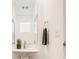 Modern powder room with a pedestal sink, sleek fixtures, and a minimalist design for a clean, contemporary look at 1811 Livery Way, Indianapolis, IN 46202