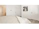 Cozy bedroom featuring comfortable bedding, minimalist decor, and ample closet space for a serene retreat at 1811 Livery Way, Indianapolis, IN 46202
