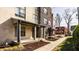 Townhomes featuring modern exteriors with sidewalks and small front yard landscaping at 1811 Livery Way, Indianapolis, IN 46202