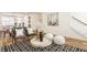 Bright living area featuring a modern rug, comfortable seating, and stylish decor for a welcoming atmosphere at 1811 Livery Way, Indianapolis, IN 46202