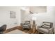 Comfortable seating arrangement with stylish decor, creating an inviting atmosphere in this bright, open space at 1811 Livery Way, Indianapolis, IN 46202