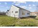 This home has a fenced in yard, a concrete foundation, and vinyl siding at 2501 Reformers Ave, Indianapolis, IN 46203
