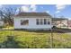 This charming home is vinyl sided and has replacement windows at 2501 Reformers Ave, Indianapolis, IN 46203