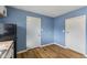 The kitchen features stylish flooring, stainless steel appliances, and lots of natural light at 2501 Reformers Ave, Indianapolis, IN 46203