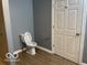 Bathroom with a stand-up shower, tile flooring, and a toilet at 3014 Arbor Ave, Indianapolis, IN 46217