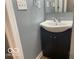 Bathroom featuring a gray vanity with a white sink at 3014 Arbor Ave, Indianapolis, IN 46217