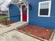 Beautiful home exterior with manicured flowerbeds, a convenient ramp, and fresh mulch at 3014 Arbor Ave, Indianapolis, IN 46217
