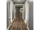 Inviting hallway featuring modern gray walls and stylish wood-look flooring at 3014 Arbor Ave, Indianapolis, IN 46217