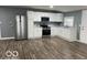Modern kitchen featuring stainless steel appliances and pristine white cabinetry at 3014 Arbor Ave, Indianapolis, IN 46217