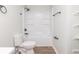 Updated bathroom with modern fixtures, white shower-tub, and sleek design at 3153 Stillmeadow Dr, Indianapolis, IN 46214