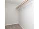 Walk-in closet with carpet, storage shelves, and a hanging rod at 3153 Stillmeadow Dr, Indianapolis, IN 46214