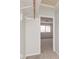 Walk-in closet with neutral carpet, storage, and bright lighting at 3153 Stillmeadow Dr, Indianapolis, IN 46214