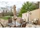 Cozy outdoor space features seating and table perfect for relaxing or entertaining guests, with a partially obstructed view at 3153 Stillmeadow Dr, Indianapolis, IN 46214