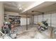 Spacious garage with ample storage space, motorcycle and a well lit interior at 3153 Stillmeadow Dr, Indianapolis, IN 46214