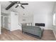 Inviting living room boasts a modern fireplace, LVP flooring, and comfortable seating area at 3153 Stillmeadow Dr, Indianapolis, IN 46214