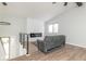 Modern open living space featuring a sleek fireplace, LVP flooring, and high ceilings at 3153 Stillmeadow Dr, Indianapolis, IN 46214