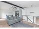 Spacious open-concept living and dining area with LVP flooring, modern lighting, and comfortable seating at 3153 Stillmeadow Dr, Indianapolis, IN 46214