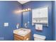 Charming bathroom featuring a vanity, toilet, and neutral beige color scheme, providing a clean and functional space at 329 Dogwood Dr, Pendleton, IN 46064