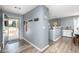 Open entryway leading to the kitchen, featuring modern flooring and neutral paint at 329 Dogwood Dr, Pendleton, IN 46064