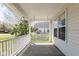 Inviting front porch with a porch swing, offering a relaxing outdoor space at 329 Dogwood Dr, Pendleton, IN 46064