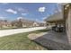 This backyard view showcases a patio and ample space for outdoor enjoyment and relaxation at 34 David Ln, Indianapolis, IN 46227