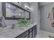 Bathroom featuring a double sink vanity with marble countertops and gray walls at 34 David Ln, Indianapolis, IN 46227