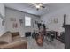 Bonus Room featuring various musicial instruments and a brown couch at 34 David Ln, Indianapolis, IN 46227