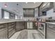 Kitchen area showcasing stainless steel appliances, granite countertops, ample cabinet space and open layout at 34 David Ln, Indianapolis, IN 46227